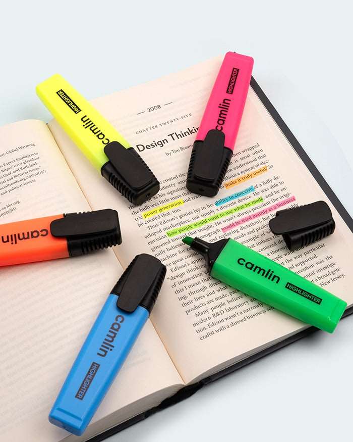 Camlin Assorted Highlighter on Book.