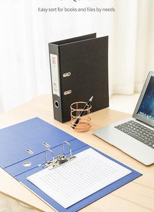 Blue and Black Deli FC Lever Arch File on table