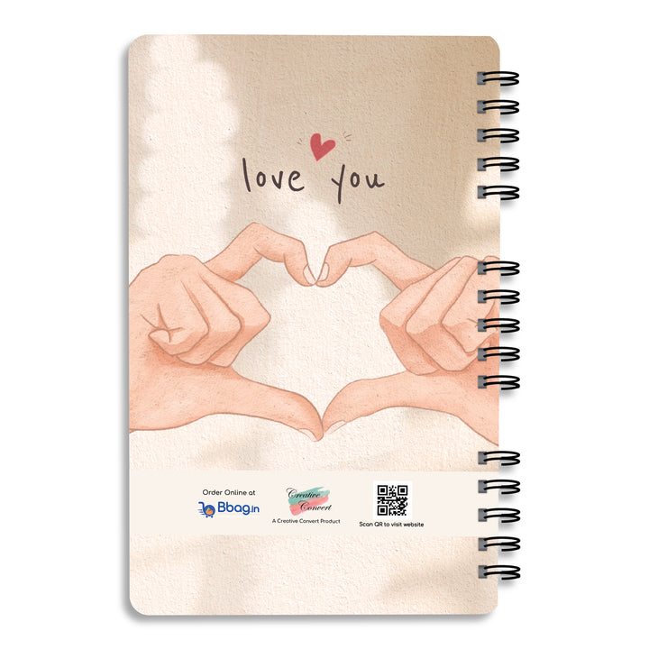 Love you with heart sign made by fingers on back cover of Creative Convert Valentine's Day Special Together Forever Journal 