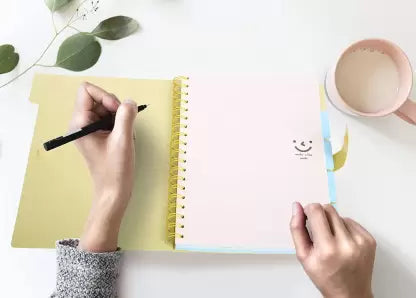 A Girl writing on Creative Convert  Cute Smile PVC Diary