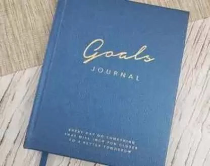 Blue Colour Creative Convert Goals Journal to set your goals  and follow them 